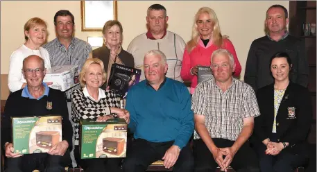  ??  ?? Gerard and Joe Walsh of Walsh Electrical presenting first prize in the Walsh Brothers Electrical Mixed competitio­n to winners John and Sally Cooper with Amy Arthur Lady Captain (back from left) Mary and Seamus O’Neill 2nd, Maureen Culloty and Ger...