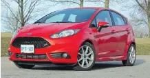  ?? GRAEME FLETCHER ?? Ford’s Fiesta ST is cheaper and more fun than Mini.