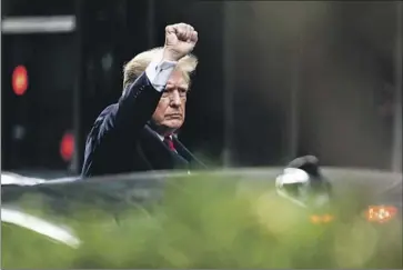  ?? Julia Nikhinson Associated Press ?? FORMER PRESIDENT TRUMP leaves Trump Tower in New York on Wednesday. He suggested without evidence that any recovered nuclear-related documents were planted by FBI agents during their search.