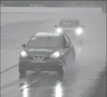  ?? COURTESY OF NISSAN ?? Nissan Micra Cup winner Jean-Michel Isabelle takes the checkered flag at Canadian Tire Motorsport Park.