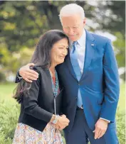  ?? CHIP SOMODEVILL­A/GETTY ?? President Joe Biden embraces Secretary of the Interior Deb Haaland before announcing the expansion of areas of three national monuments Friday.