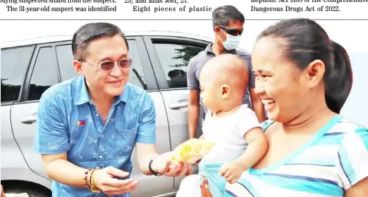  ?? PHOTOGRAPH COURTESY OF SBG ?? SENATOR Bong Go greets a mother and her baby during one of his provincial visits.