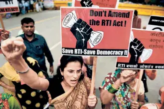  ?? ?? A PROTEST MARCH against amendments to the RTI Act, in New Delhi in 2019.
