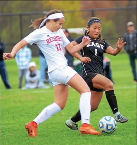  ?? GREGG SLABODA — TRENTONIAN PHOTO ?? Allentown’s Vanessa Rodriguez, left, and Toms River East’s Julia Lamparello battle for the ball during the Redbirds’ 2-1 victory in the Central Jersey Group III sectional final.