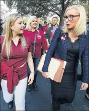  ?? Susan Stocker Sun-Sentinel ?? JACLYN CORIN, 17, with Florida state Sen. Lauren Book, is among the Parkland students planning Saturday’s march in Washington for tougher gun laws.