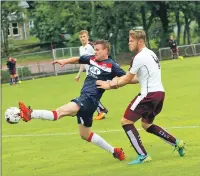  ??  ?? Paul Carmichael stretches for the ball in the 0- 0 draw with Hearts.