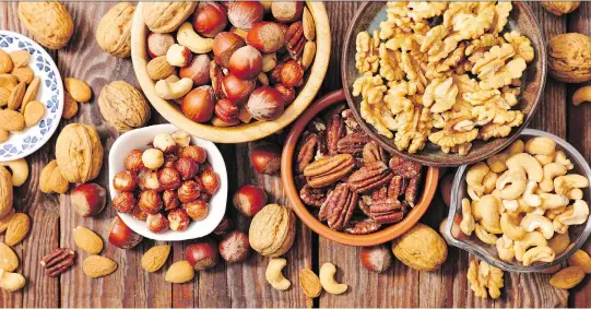  ?? PHOTOS: GETTY IMAGES/ISTOCKPHOT­O ?? Nuts add crunch and flavour to many dishes. Toast small amounts in a skillet over medium heat or in a 350 F (175 C) oven for 8-10 minutes.