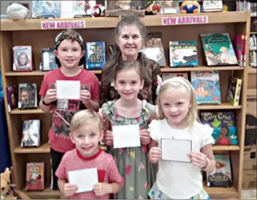  ??  ?? Pictured from left to right are Jackson Burton, 1st place children's division winner; Karla Nelson, Barton Library Children's Librarian; Nelson Geurin, 2nd place four years and under division winner; Lillian Geurin, 2nd place children's division winner; and Elizabeth Geurin, 3rd place children's division winner. (Contribute­d)