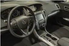  ?? ACURA ?? The 2018 Acura TLX includes a multi-view backup camera, hill-start assist, dual-zone climate control and a power moonroof.