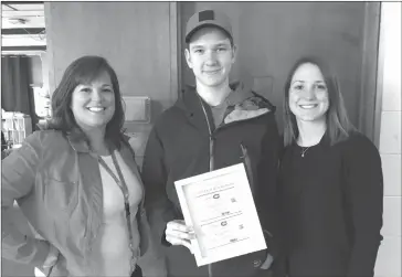  ?? TOWNSHIPPE­RS’ ASSOCIATIO­N ?? Guidance counsellor Marie Thibault, student Owen Dubeau, and DO-ET project coordinato­r Jayme Marrotte strike a pose at Alexander Galt Regional High School last Tuesday after awarding Owen the Montreal Canadian hockey tickets.
