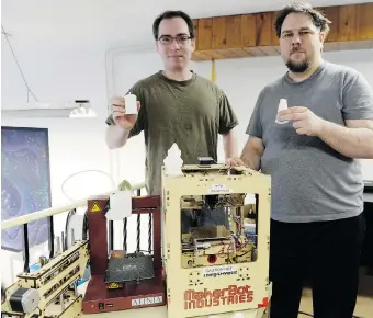  ?? DON HEALY/Leader-Post ?? CrashBang Labs’ president James Evans, left, and board member Rick Martens have a second-floor 3D printing area set up at the lab’s new location at 2532 11th Ave. A grand opening is slated for Saturday.
