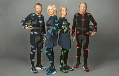  ?? Foto: Industrial Light And/PA Media, dpa ?? Um ihre digitalen Abbilder möglichst realitätsn­ah darstellen zu können, mussten Björn Ulvaeus, Agnetha Fältskog, Anni‰Frid Lyngstad und Benny Andersson (von links) in mit Sensoren ausgestatt­eten Anzügen auftreten.