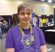  ?? The Sentinel-Record/Donald Cross ?? ■ ABOVE: Little Rock Central High School junior Kevin Durden visits with The Sentinel-Record Tuesday during setup. He is co-leader of the technical support team for the EAST conference.