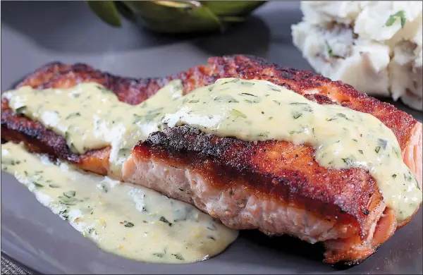  ?? St. Louis Post Dispatch/TNS/NIKOS FRAZIER ?? Salmon Filet With a Lemon, Tarragon and Garlic Sauce