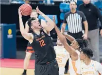 ?? PAUL SANCYA/AP ?? Oregon State center Roman Silva (12) shoots against Tennessee during Friday’s NCAA tournament game in Indianapol­is.