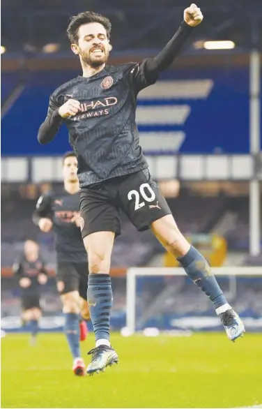  ?? Reuters ?? Manchester City’s Bernardo Silva celebrates after scoring their third goal against Everton during their EPL match on Wednesday.