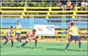  ??  ?? A Central Railway player is surrounded by BPCL defenders during their Pool ‘B’ league match.