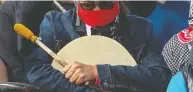  ?? ANDREW VAUGHAN / THE CANADIAN PRESS FILES ?? A Mi'kmaq drummer pauses during a prayer as members of the Sipekne'katik First Nation bless their
lobster fleet earlier this month.