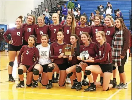  ?? MIKE STRIBL — DAILY FREEMAN ?? The Kingston High School girls volleyball team pose for a team picture after their victory over New Rochelle in Sunday’s Class AA regional final at SUNY New Paltz.