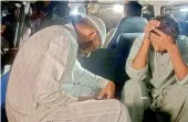  ?? — AP ?? Relatives of Imran Ali convicted of killing eight children avoid media in a van while arrivIng to receive his body at a prison in Lahore on Wednesday.