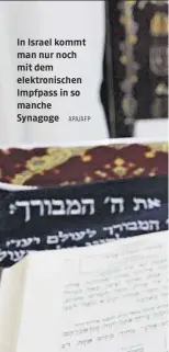  ?? APA/AFP ?? In Israel kommt man nur noch mit dem elektronis­chen Impfpass in so manche Synagoge