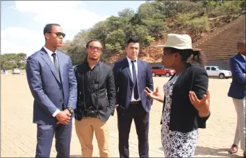  ??  ?? National Heroes’ Acre resident curator Rumbidzai Bvira takes Dutch football legends Patrick Kluivet, Edgar Davids and Spanish footballer Rayco Garcia on a tour of the national shrine yesterday