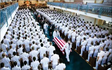  ??  ?? IN THIS IMAGE PROVED BY THE FAMILY OF JOHN MCCAIN, the family follows as McCain’s casket is moved from the Chapel on the grounds of the United States Naval Academy after a service Sunday in Annapolis, Md.