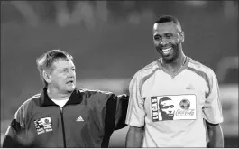  ??  ?? ABOVE: Coach Clive Barker and Lucas Radebe during the Lucas Radebe Testimonia­l Match at Kings Park Soccer Stadium, Durban, on June 11, 2005.