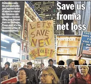  ??  ?? Protesters rally for net neutrality and against federal plans to repeal the fairness rule outside a Verizon store near Bryant Park on Thursday. It was part of a nationwide series of demonstrat­ions.