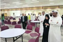  ?? Delores Johnson / The National ?? Dr Amal Al Qubaisi, director general of Abu Dhabi Education Council, tours two new schools yesterday.