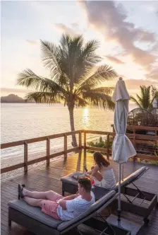  ??  ?? DOWN TIME: West-facing deck chairs near the pool are ideal for viewing the sunset at the Sheraton Tokoriki Island Resort in Fiji.