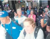  ?? ?? Passengers of Flight FA 252 queuing at the FlySafair counter at OR Tambo Internatio­nal Airport at 01:45 last week Thursday morning to arrange new tickets to fly to George.