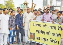  ?? HT PHOTO ?? BJP district president Jalam Singh Rawalot and former president Aaduram Meghwal protest against the rape and murder of a Dalit minor, in Barmer.