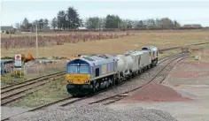  ?? MATTHEW TOWE ?? Right: GBRf ’s Nos. 66797/66735 had a run along the Far North Line on April 25, powering the weedkillin­g train from Inverness to Thurso. They are pictured the following day in the yard at Georgemas Junction before becoming what is thought to be the first visit of the class to Wick later that day, on their way back to Inverness.