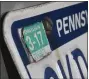  ?? BEN HASTY — MEDIANEWS GROUP ?? Pennsylvan­ia stopped using vehicle registrati­on stickers in 2017, but state lawmakers are considerin­g bringing them back.