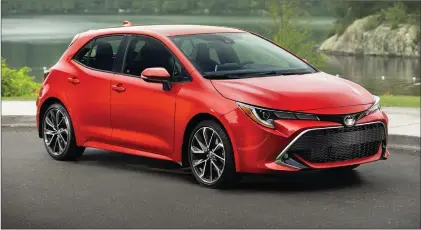  ?? TOYOTA PHOTOS ?? 2019 Toyota Corolla hatchback XSE (1): As it is around town, the Toyota Corolla hatchback’s ride consistent­ly balances sportiness and comfort.