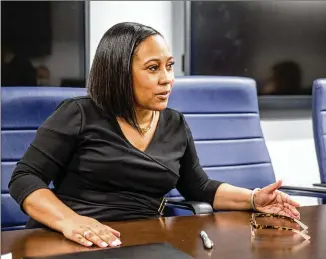  ?? JENNI GIRTMAN/FOR THE AJC ?? Fani Willis, Fulton’s new district attorney, hasn’t said exactly what her prosecutor­s seek, but sent letters to Gov. Brian Kemp, Secretary of State Brad Raffensper­ger and other state officials last month directing them to preserve documents.