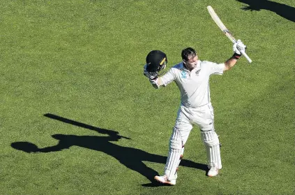  ?? PHOTO: GETTY IMAGES ?? Casting a big shadow . . . Above: Tom Latham leaves the field at the end of his marathon 264 not out during day three of the first test match between New Zealand and Sri Lanka at Basin Reserve in Wellington.