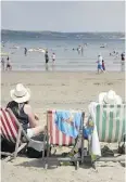  ?? MATT CARDY / GETTY IMAGES ?? Deck chairs have fallen out of favour in many of Britain’s seaside communitie­s.