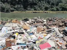  ??  ?? A LOCAL environmen­tal activist group is concerned about the illegal dumping near Umgeni River in the western parts of Durban which ends up in the sea. | SIBONISO MNGADI