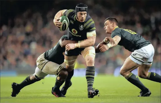  ?? PICTURE: REUTERS ?? BATTERING RAM: Ireland loose-forward Sean O’brien, centre, barges his way past Springboks Siya Kolisi, left and Jesse Kriel during yesterday’s Test in Dublin.