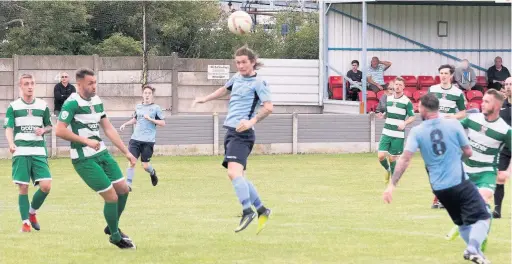  ?? Paul Watson ?? Joe Holt rises for a header for Runcorn Town in their pre-season clash with Stalybridg­e Celtic at Pavilions – turn to page 59 for a report of the game and details of more signings at the club while the latest news from Runcorn Linnets is on page 61.