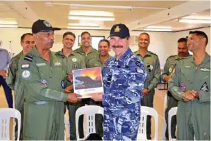  ??  ?? (LEFT)AIR MARSHAL LEO DAVIES, CHIEF OF AIR FORCE FOR RAAF, RECEIVED BY AIR MARSHAL C. HARI KUMAR OF IAF. RAAF CHIEF INTERACTED WITH THE AIR-WARRIORS AND APPRECIATE­D THE GOOD WORK PUT UP BY THE TEAM IAF.