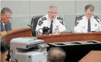  ?? CATHIE COWARD HAMILTON SPECTATOR FILE PHOTO ?? Hamilton could see a new police chief hired by April after Chief Eric Girt, centre, announced his retirement last month.