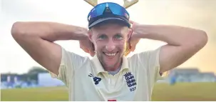  ??  ?? England captain Joe Root is all smiles after defeating Sri Lanka in the second Test