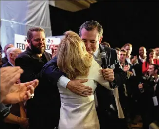  ?? TAMIR KALIFA / THE NEW YORK TIMES ?? Sen. Ted Cruz embraces his wife, Heidi, at his election night victory party in Houston. He defeated U.S. Rep. Beto O’Rourke, an El Paso Democrat who became a darling of the left.