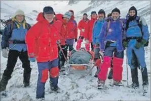  ??  ?? Lochaber Mountain Rescue Team members carry out another rescue.