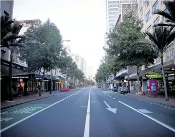  ?? Photo / Dean Purcell ?? We got used to images of empty streets – such as this one of Queen St on Day 7 of the Covid lockdown – in the course of 2020.