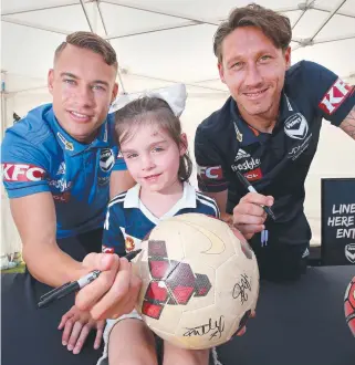  ?? Pictures: GLENN FERGUSON ?? TOP: Amelia Poole, 5, meets Melbourne Victory players Jai Ingham and Mark Milligan at Steampacke­t Gardens yesterday. BELOW: Jackson Van Beek, 8, and James Van Beek, 4, from Grovedale, line up for signatures. RIGHT: Jet Amenta, 9, lines up the target; Jasmine McKenzie, 12, strikes, and Lenny Vanheer, 8, loads up.