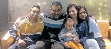  ?? | Supplied ?? AMLESH Rajcoomar with his wife, Suehana Sewpersad-Rajcoomar, and their children, Treshaai, Aariyah and Saihaar.